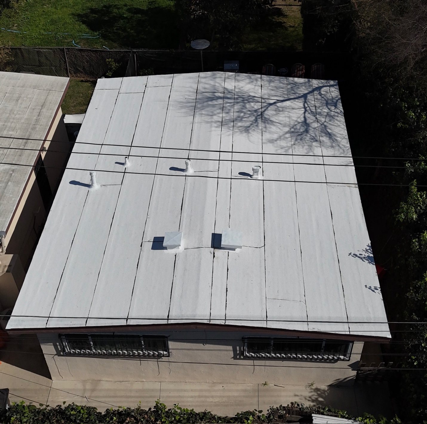 Suncraft Roofing project photo paired with Eve G.'s customer review